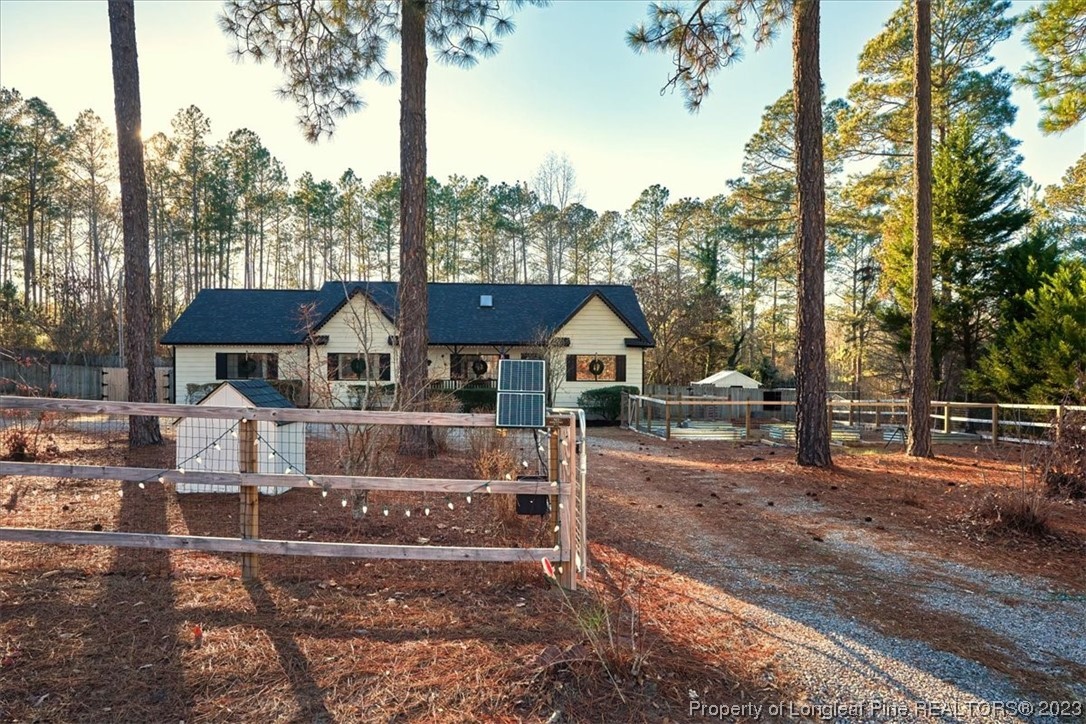 8199 Calloway Road Aberdeen, NC 28315 - Photo 5 of 50 a front view of a house with a yard
