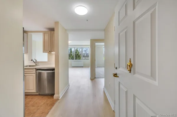 a kitchen with stainless steel appliances a stove and a refrigerator