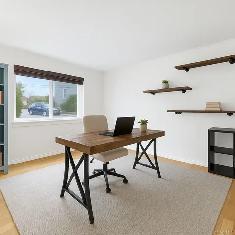 a workspace with furniture and a window