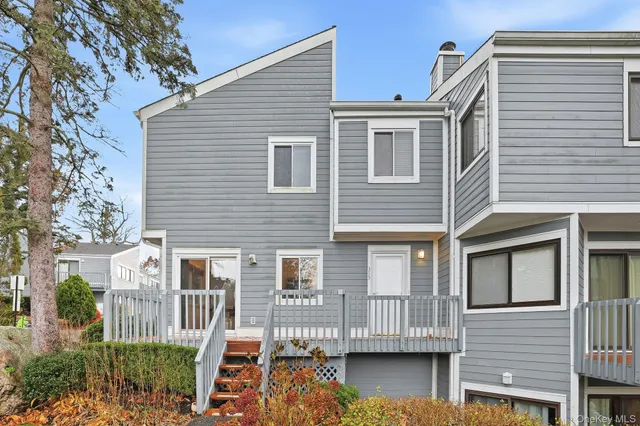 an outdoor view of shop with parking space