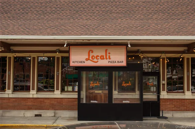 a view of a car park in front of building