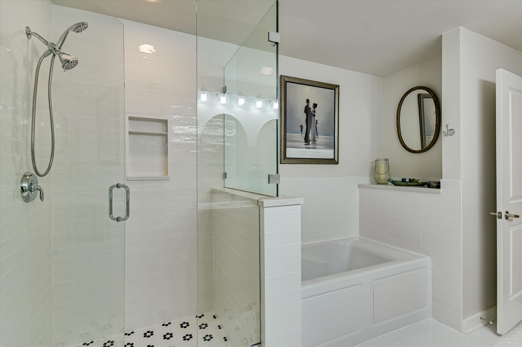 360 Nueces Street, Unit 1405 Austin, TX 78701 - Photo 16 of 40 a bathroom with a shower a mirror and a shower