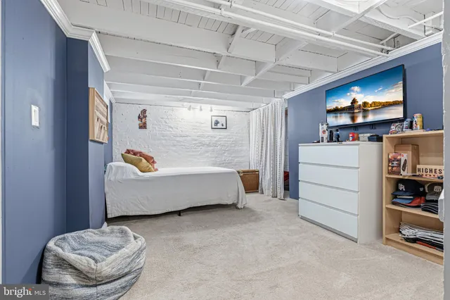 a room with furniture and a flat screen tv