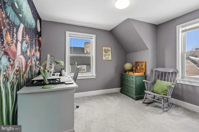 a bed room with a bed and a chandelier