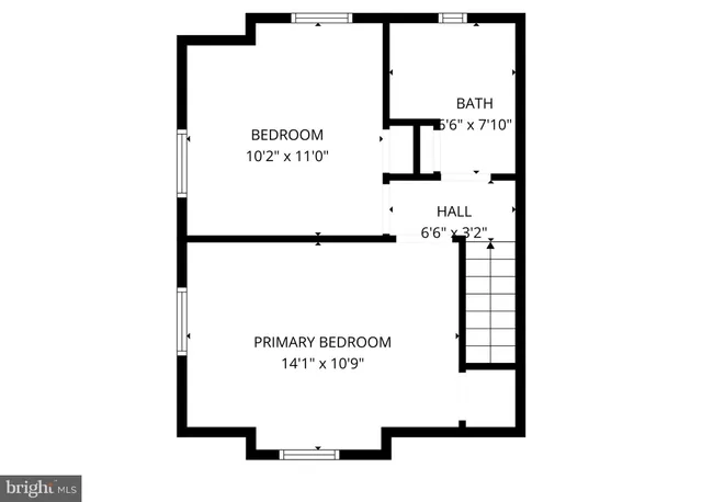 a backyard of a house with outdoor seating