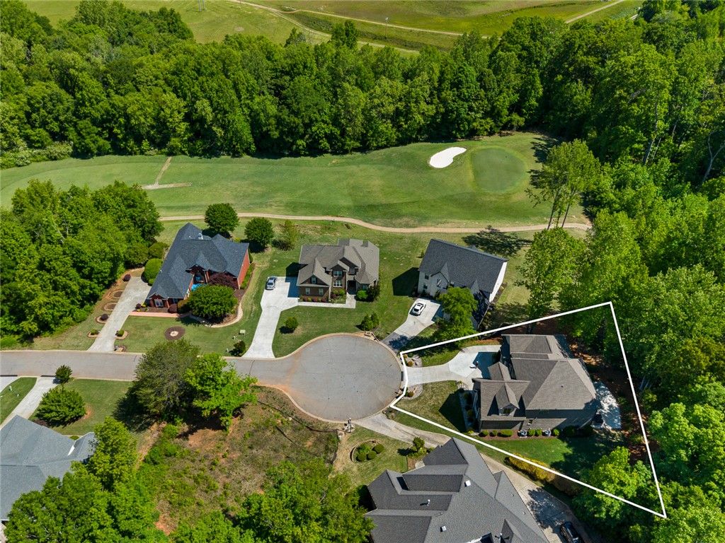 140 Turnberry Road Anderson, SC 29621 - Photo 37 of 44 An aerial perspective reveals a cul-de-sac community nestled beside a golf course.