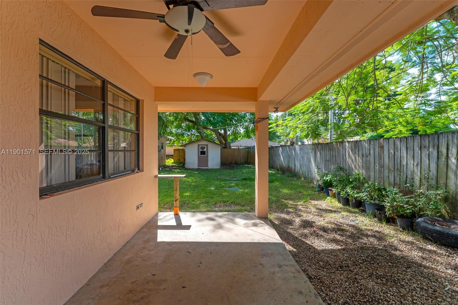 222 Northwest 14th Street Homestead, FL 33030 - Photo 18 of 26 a backyard of a house with green space