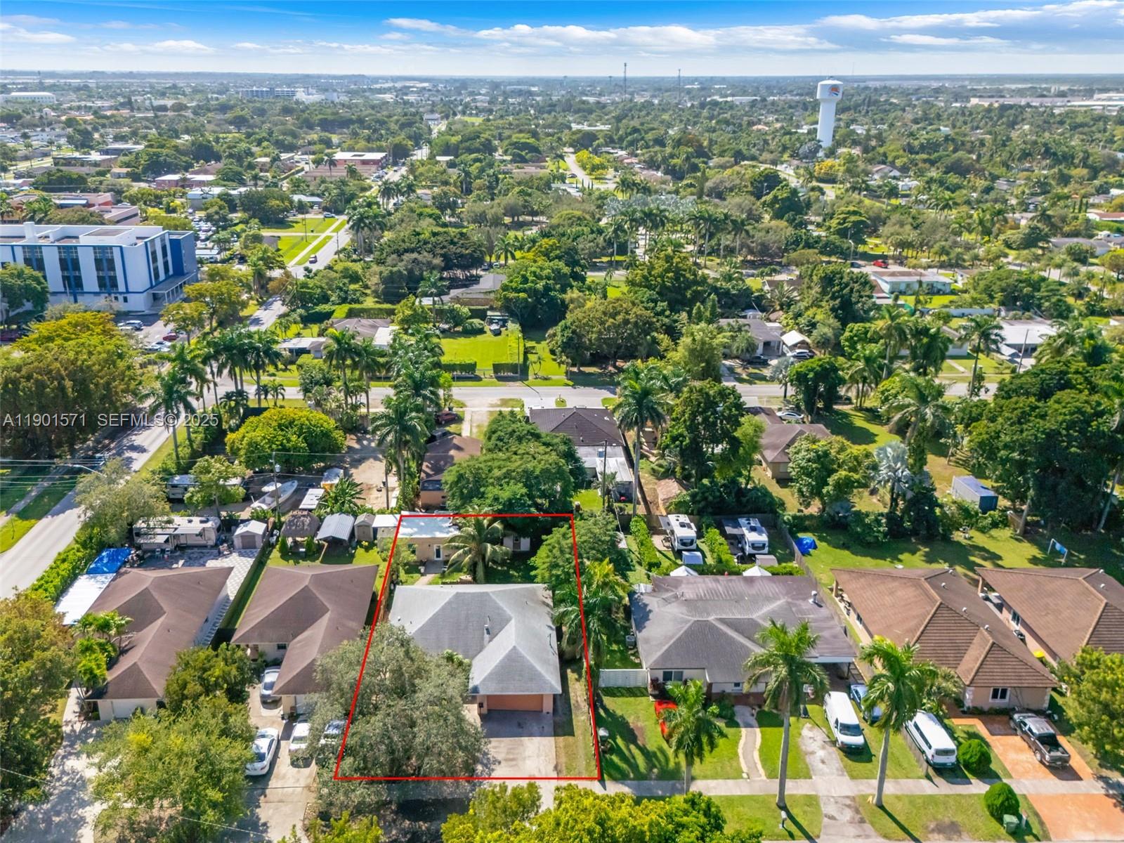 222 Northwest 14th Street Homestead, FL 33030 - Photo 3 of 26 an aerial view of residential houses with outdoor space and trees