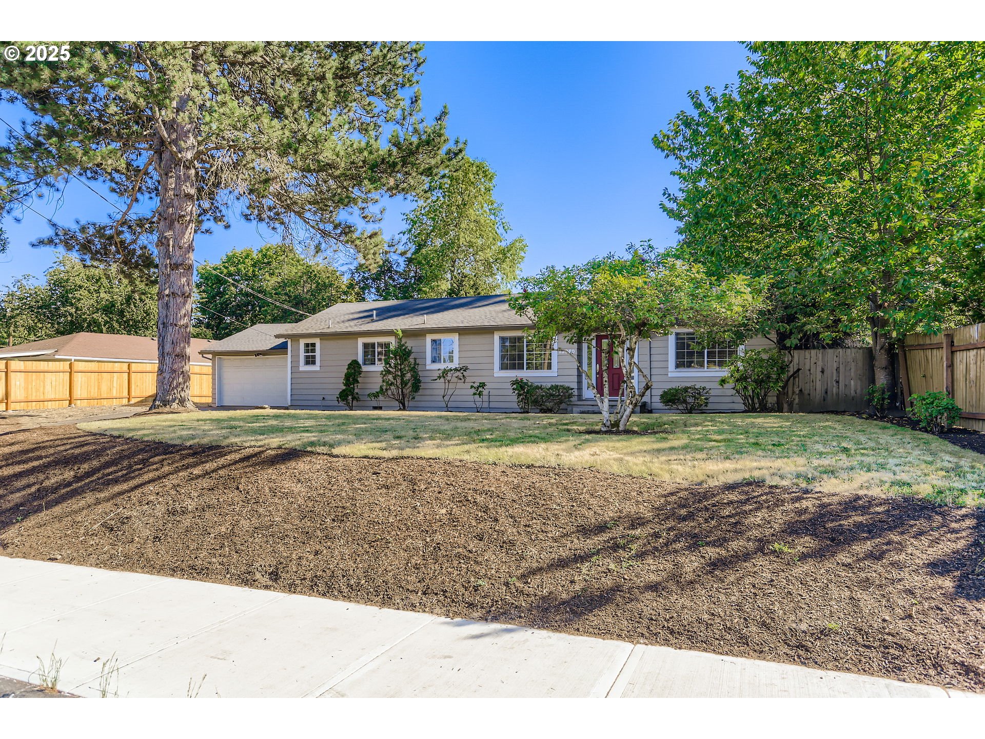 13860 Southwest Butner Road Beaverton, OR 97006 - Photo 2 of 29 a view of a house with a yard