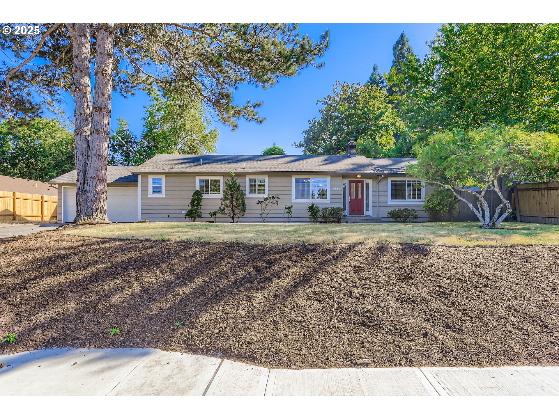 13860 Southwest Butner Road Beaverton, OR 97006 - Photo 3 of 29 a house view with a garden space
