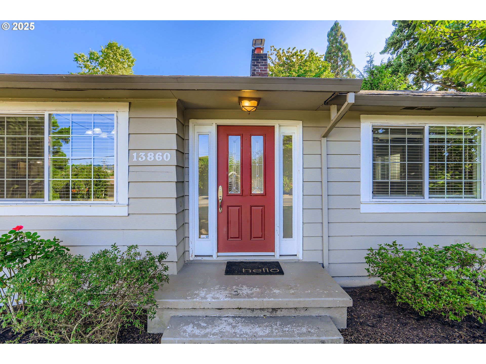 13860 Southwest Butner Road Beaverton, OR 97006 - Photo 4 of 29 a front view of a house with entryway