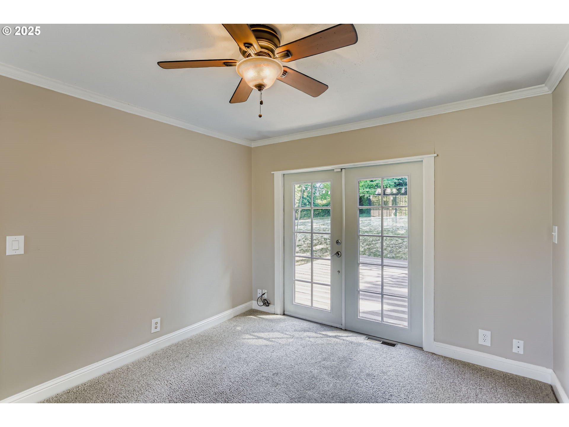 13860 Southwest Butner Road Beaverton, OR 97006 - Photo 6 of 29 an empty room with windows and fan