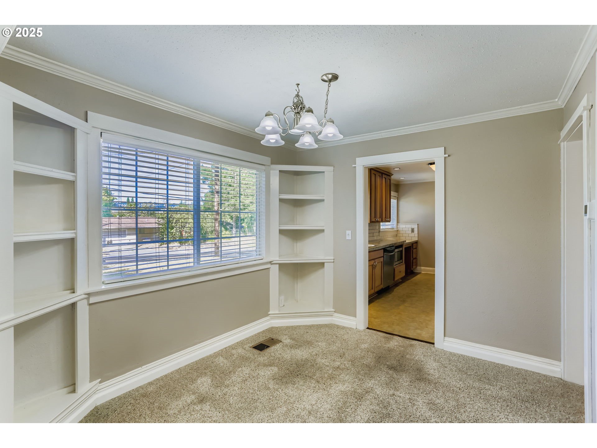 13860 Southwest Butner Road Beaverton, OR 97006 - Photo 8 of 29 a view of a livingroom with a chandelier
