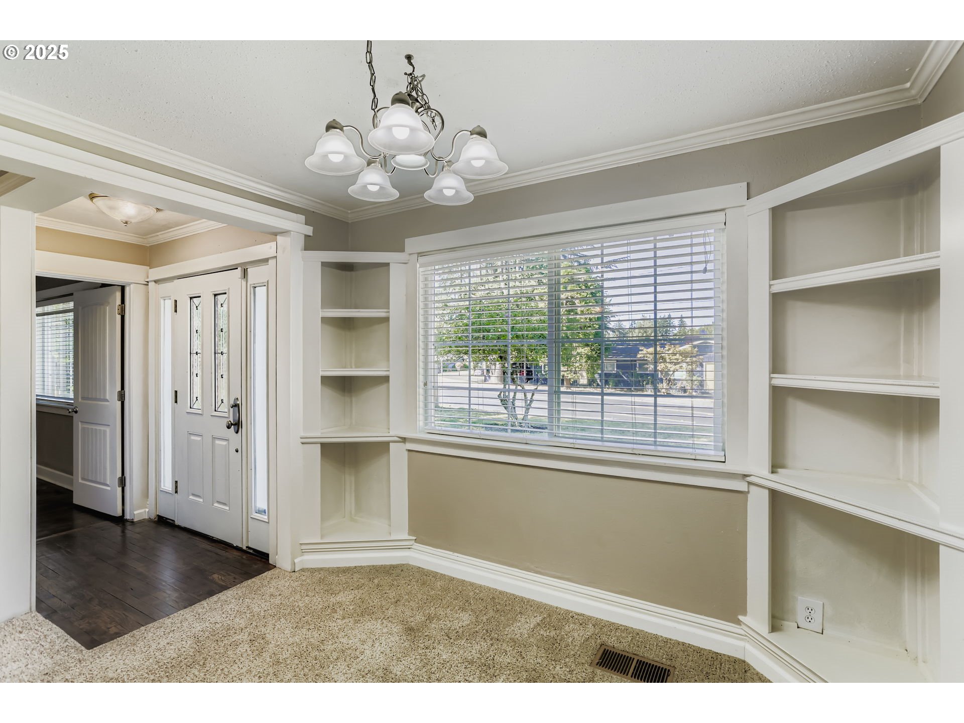 13860 Southwest Butner Road Beaverton, OR 97006 - Photo 9 of 29 a view of an empty room with a window and kitchen view