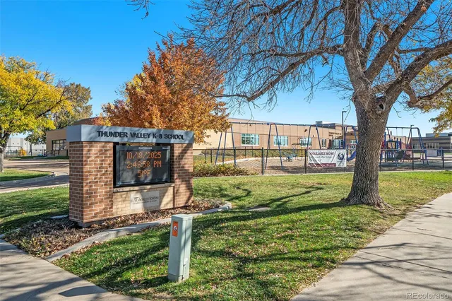 a view of a street with houses
