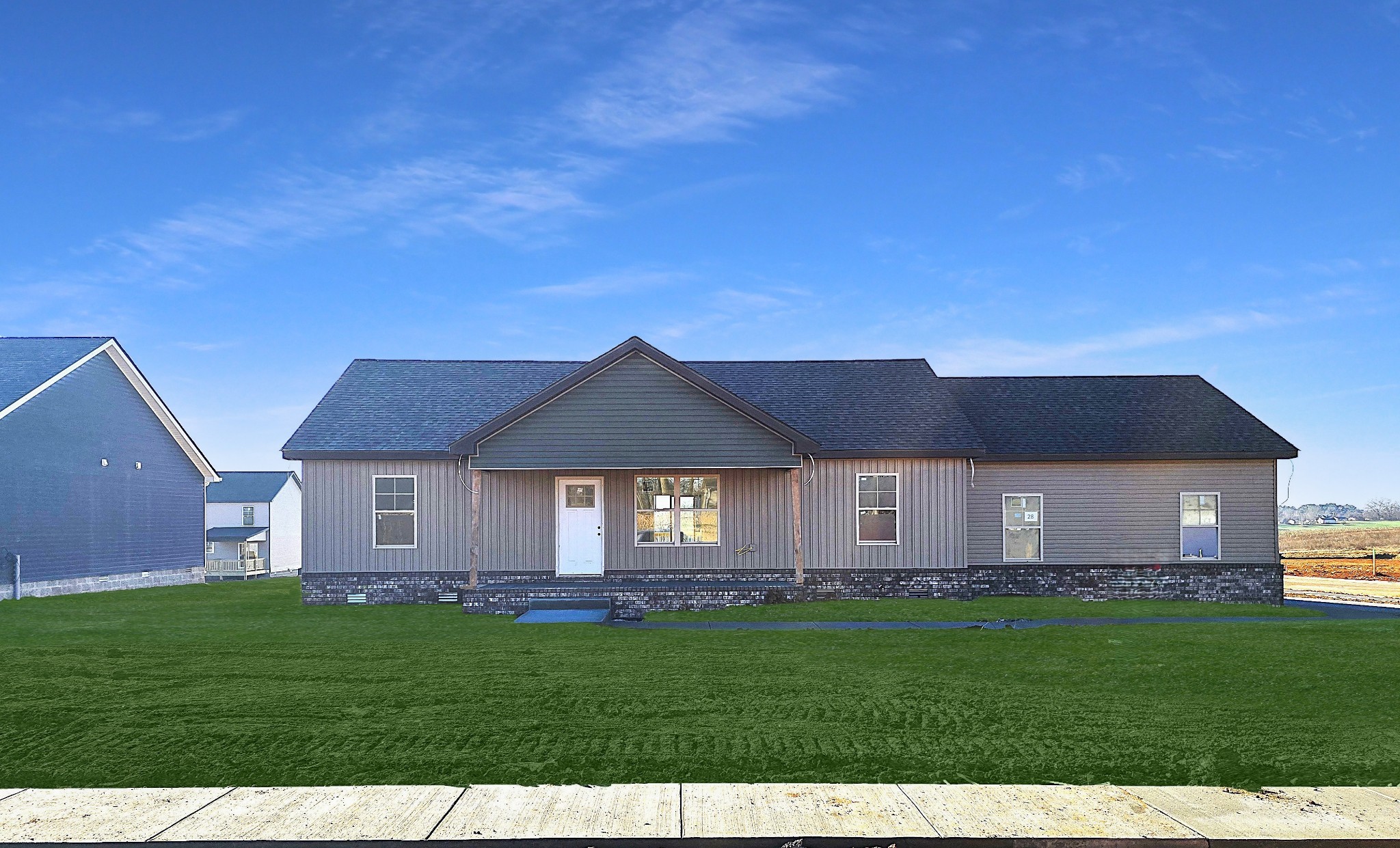 28 Echo Ridge Oak Grove, KY 42262 - Photo 2 of 12 a view of a yard in front of a house with a large tree