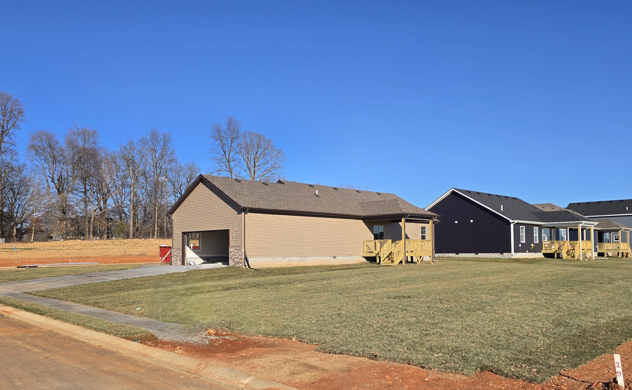 28 Echo Ridge Oak Grove, KY 42262 - Photo 8 of 12 a front view of a house with a yard