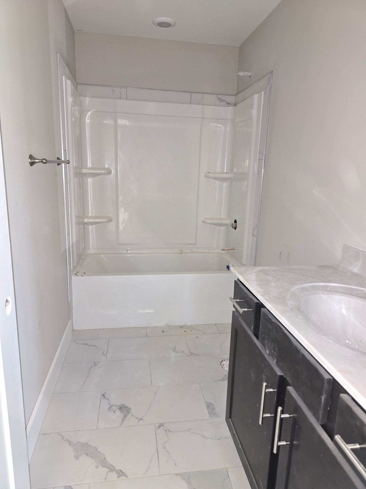 28 Echo Ridge Oak Grove, KY 42262 - Photo 10 of 12 a view of a bathroom with a sink and a bathtub