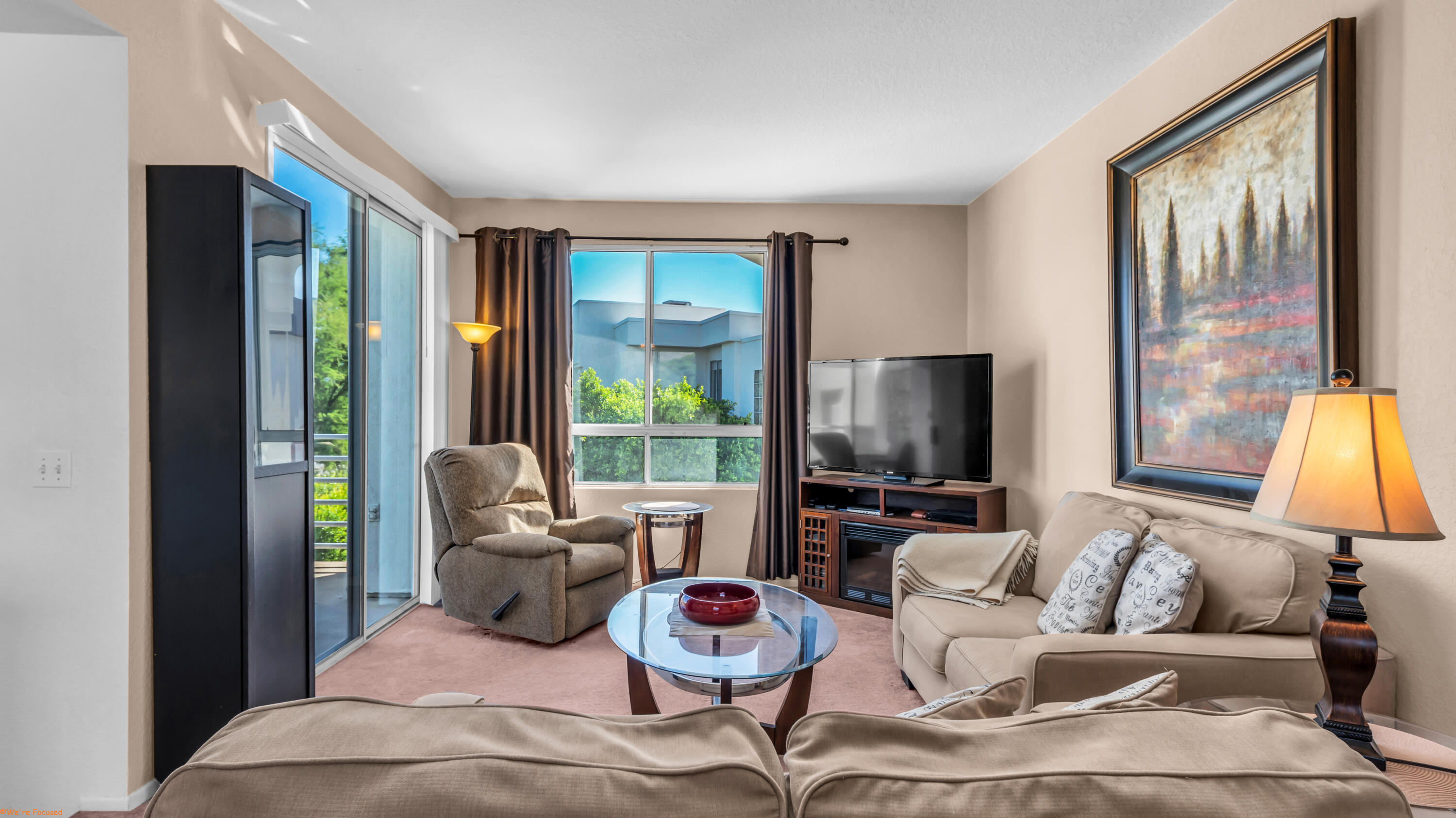 401 El Cielo Road, Unit 236 Palm Springs, CA 92262 - Photo 2 of 29 a living room with furniture and a large window