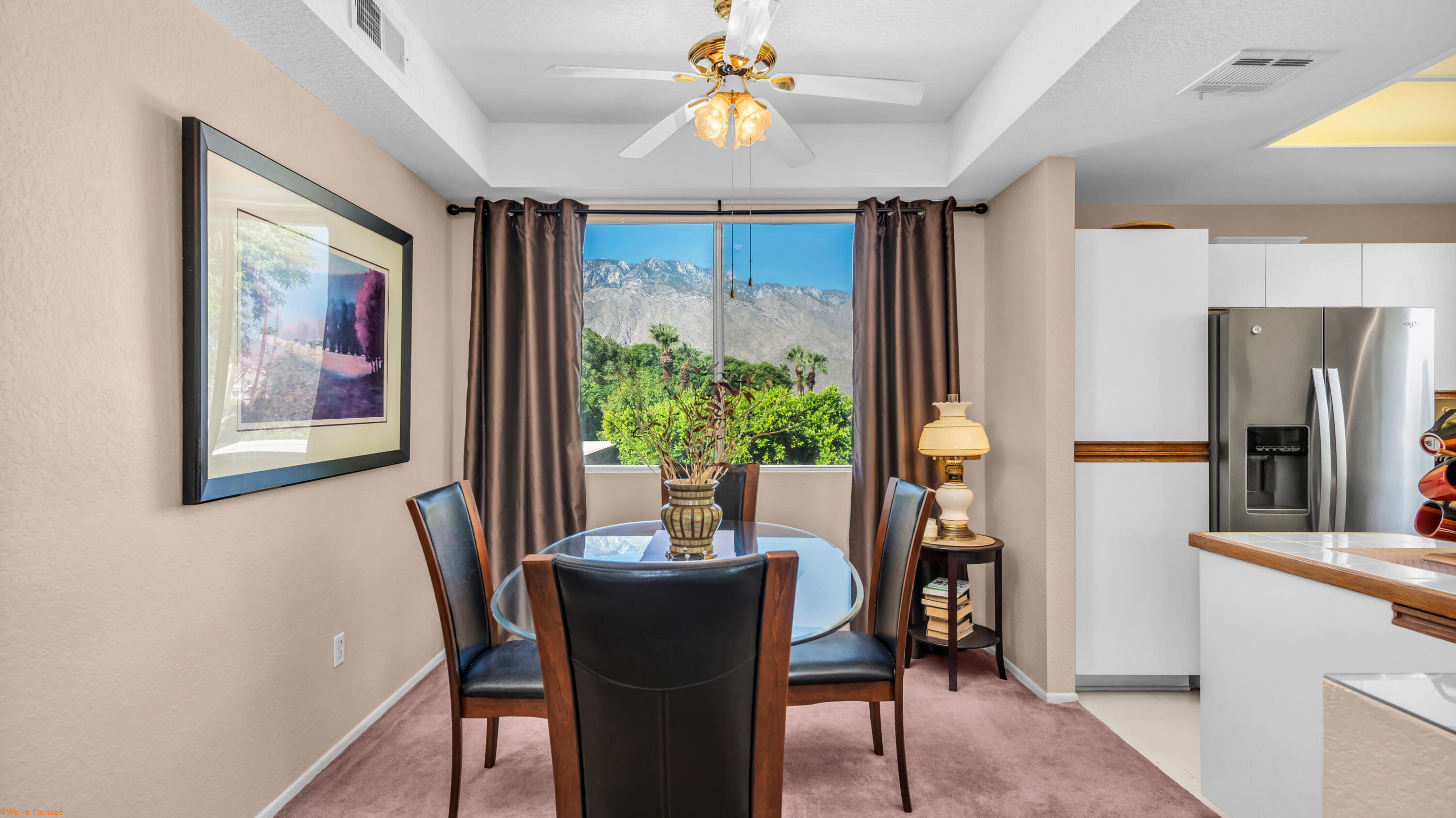 401 El Cielo Road, Unit 236 Palm Springs, CA 92262 - Photo 3 of 29 a view of a dining room with furniture window and wooden floor