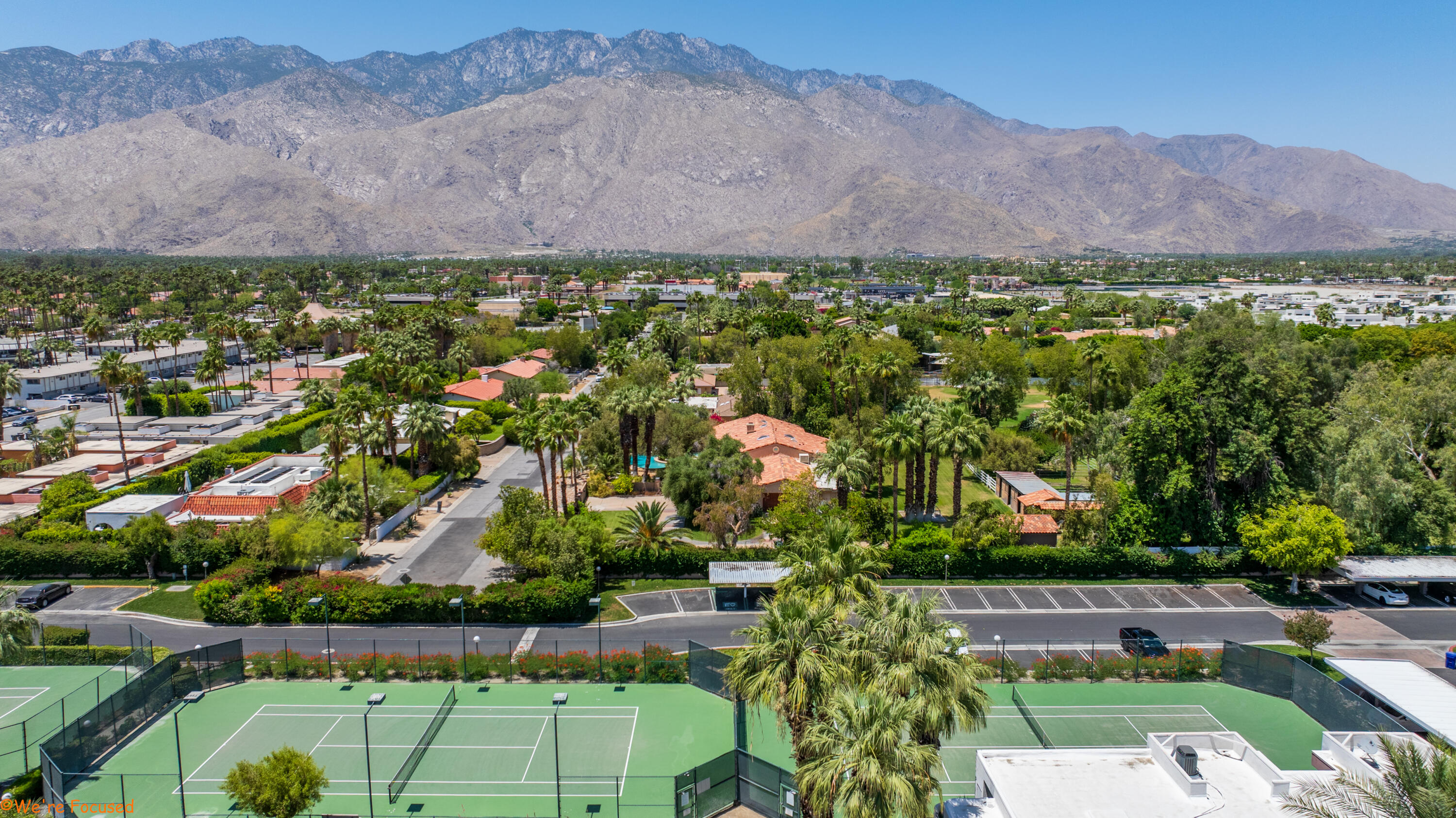 401 El Cielo Road, Unit 236 Palm Springs, CA 92262 - Photo 8 of 29 a view of a lush green hillside and houses