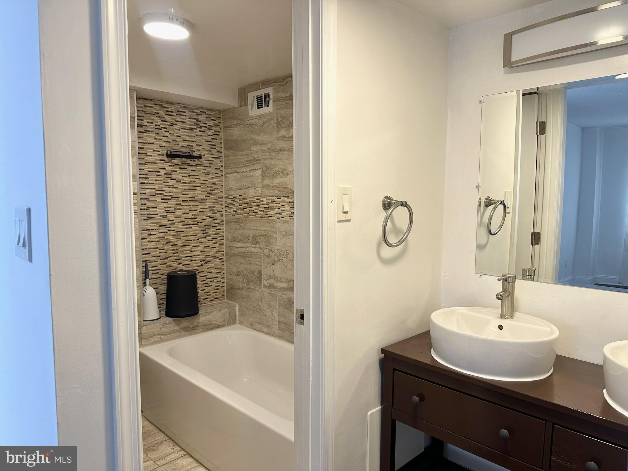 1836 Metzerott Road, Unit 901 Hyattsville, MD 20783 - Photo 16 of 25 Modern bathroom with sleek finishes.