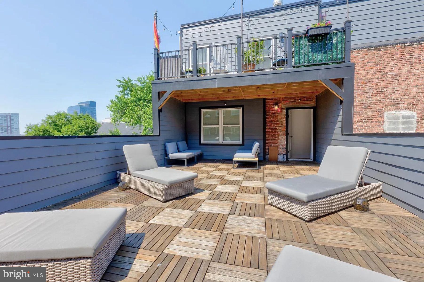 1617 Eastern Avenue, Unit 201 Baltimore, MD 21231 - Photo 13 of 13 a view of living room filled with furniture and window
