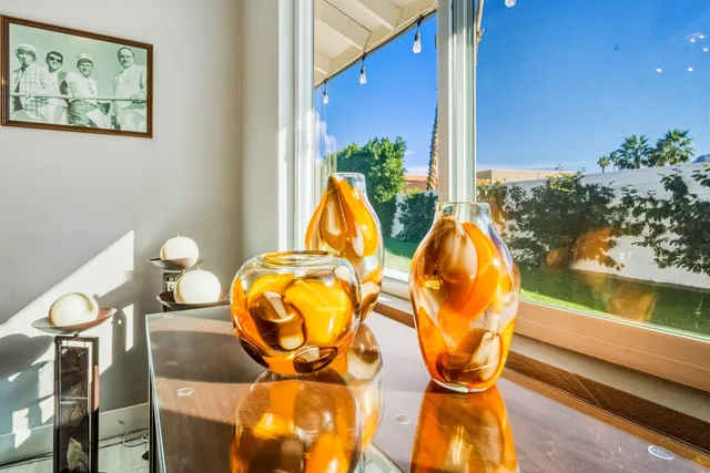an aerial view of a house with yard
