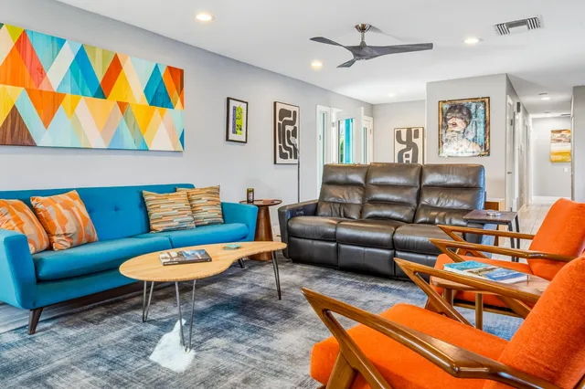 a view of a hallway with a washer and dryer