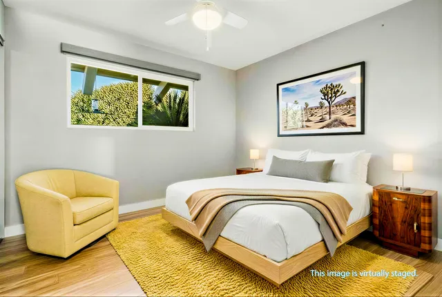 a room with wooden floor and window