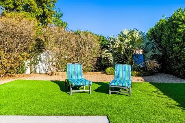 a view of a back yard of the house