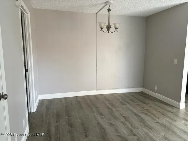 a kitchen with a stove and cabinets