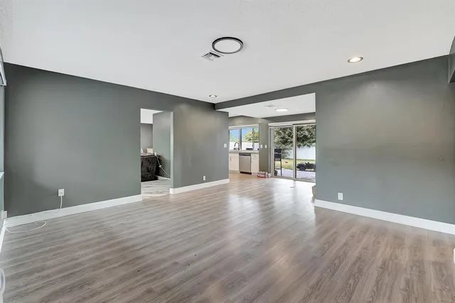 a bedroom with a bed and glass floor