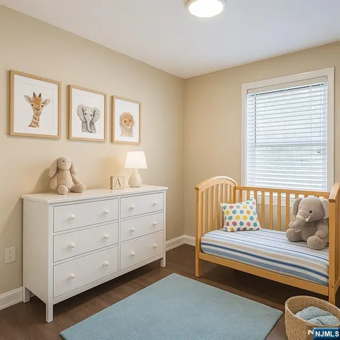 a bedroom with furniture and window