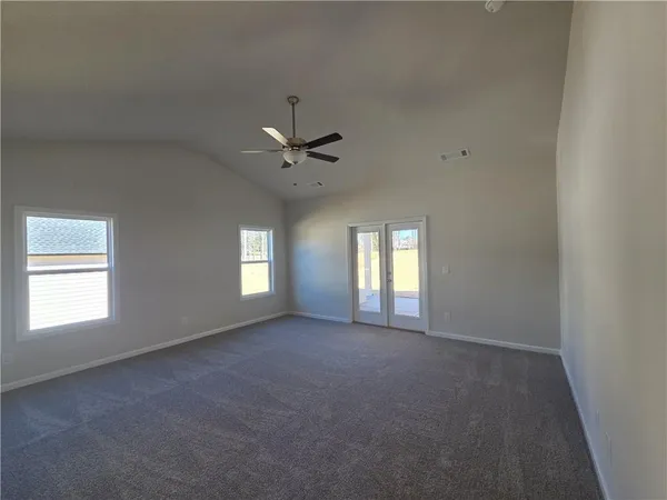 an empty room that has a window
