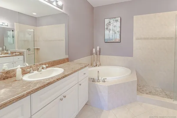 a living room with furniture and a desk