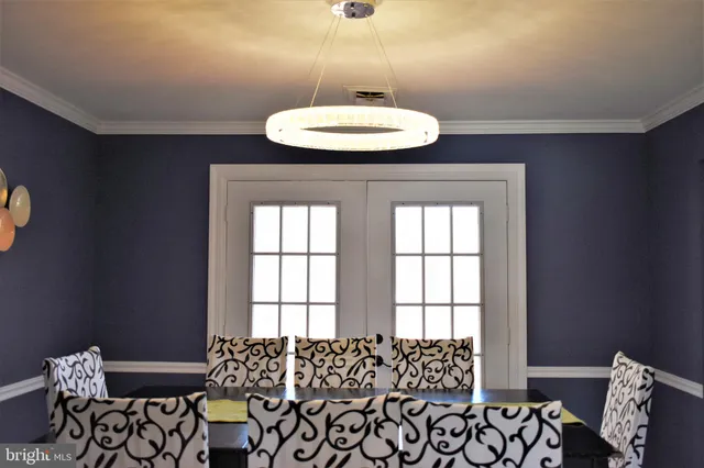 a kitchen with a stove sink and cabinets
