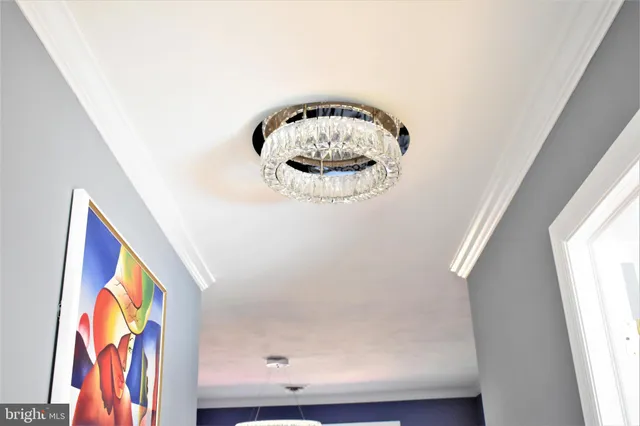 a kitchen with stainless steel appliances granite countertop a refrigerator stove and sink