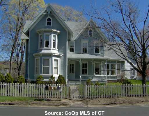 265 Seymour Road Woodbridge, CT 06525 - Photo 1 of 1 a front view of a house with a garden