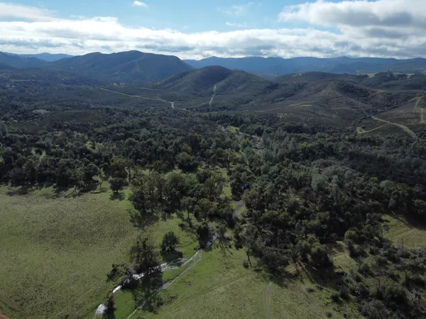 a view of mountains and valleys