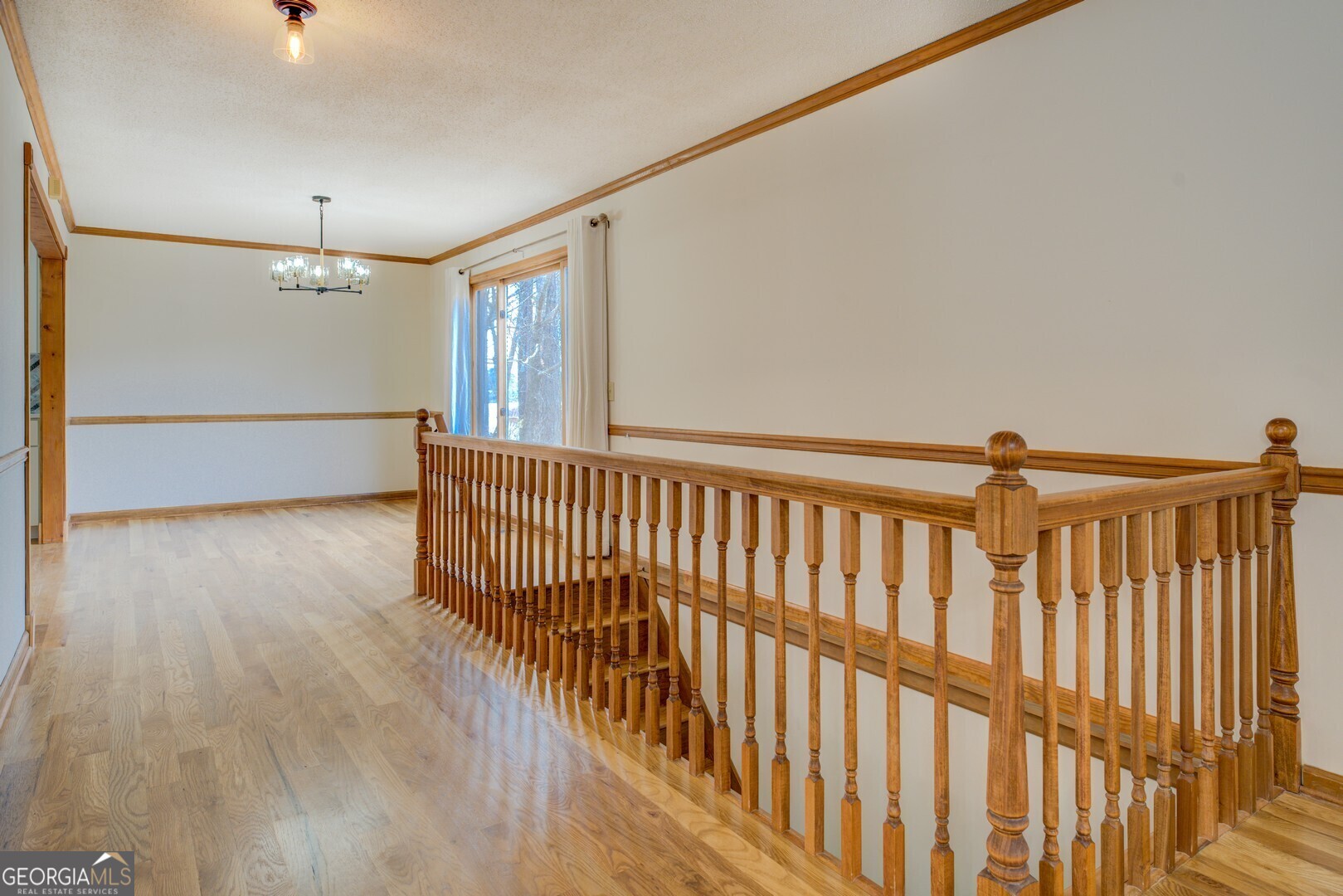 71 Canvasback Court Monticello, GA 31064 - Photo 25 of 78 a view of a hallway with wooden floor