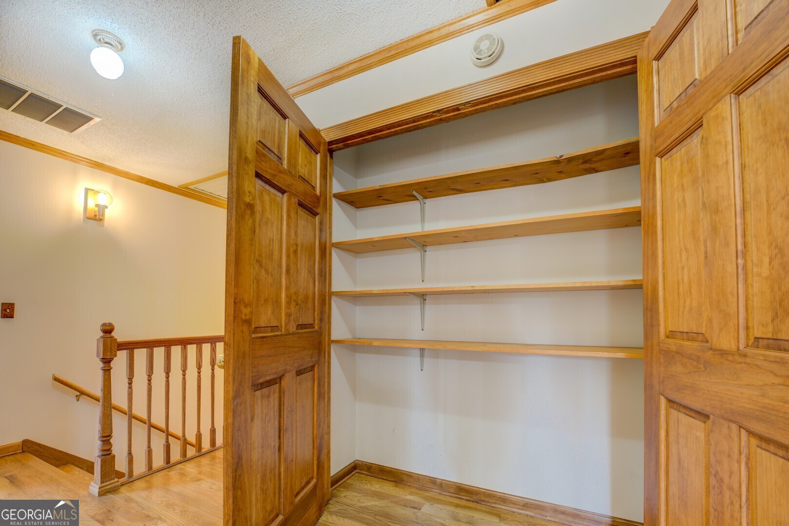 71 Canvasback Court Monticello, GA 31064 - Photo 54 of 78 a view of walk in closet with empty racks