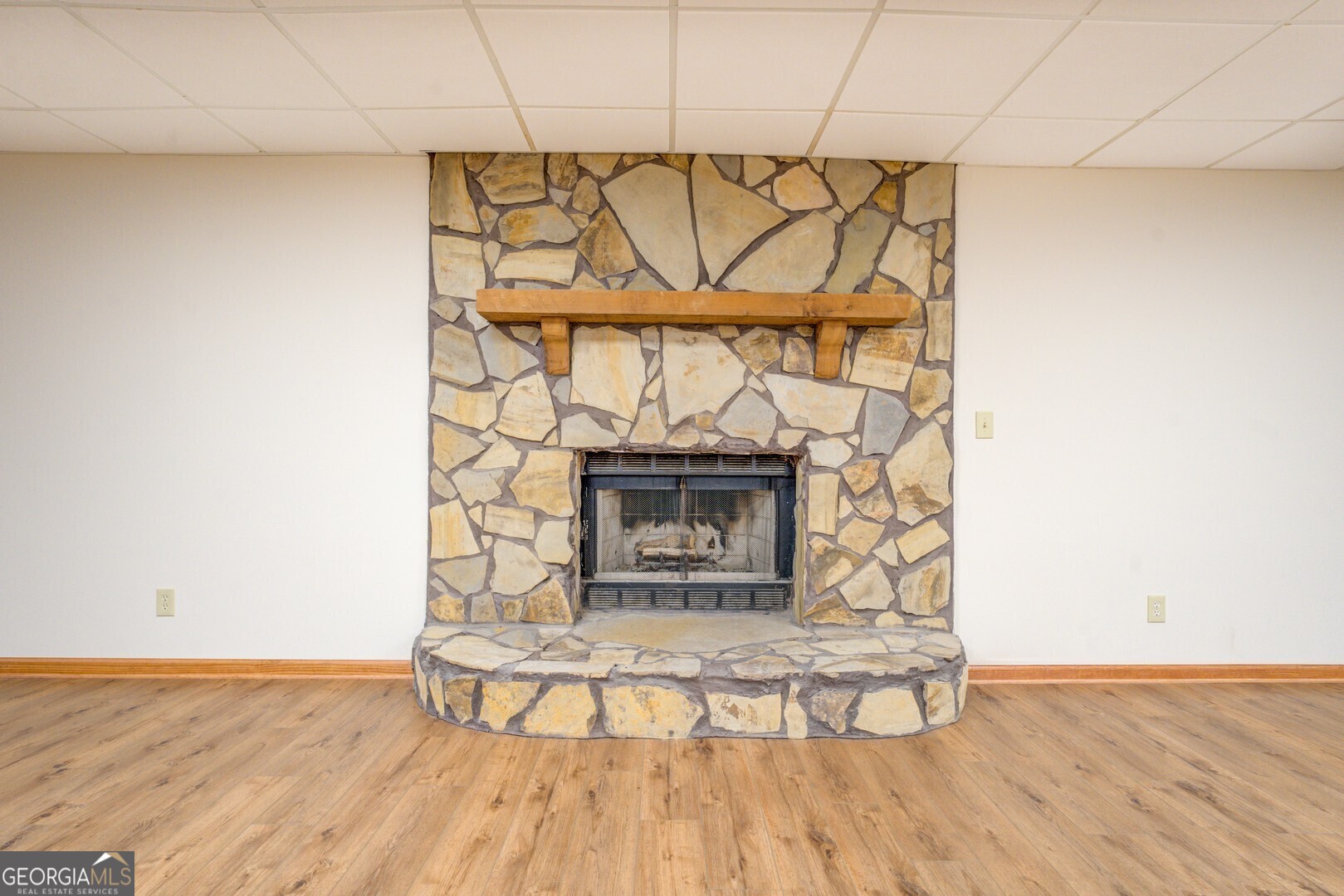 71 Canvasback Court Monticello, GA 31064 - Photo 59 of 78 a living room with a wooden floor