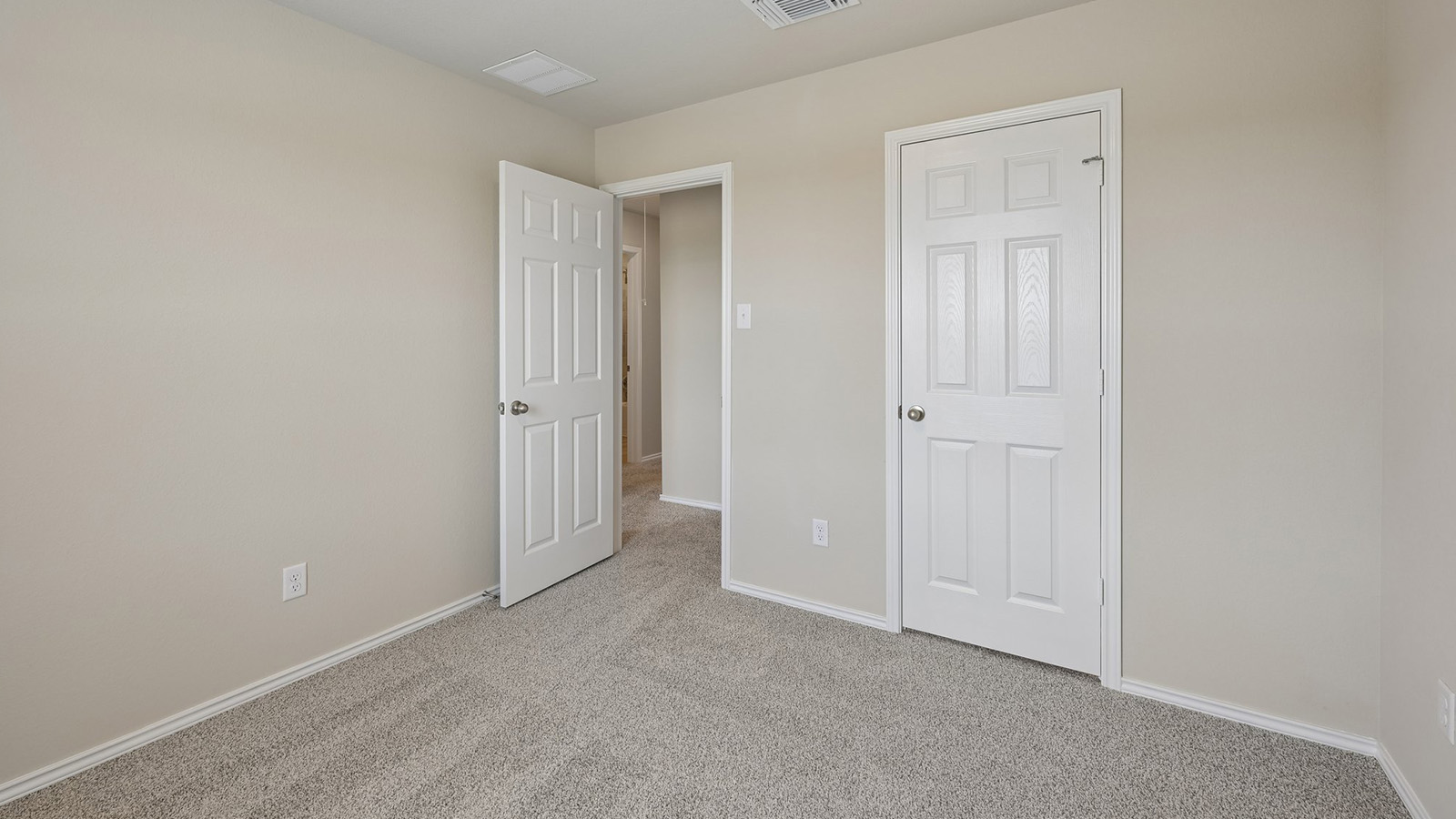 372 Old Stage Coach Road Jarrell, TX 76537 - Photo 16 of 25 Soft carpeting underfoot defines this versatile bedroom with neutral walls.