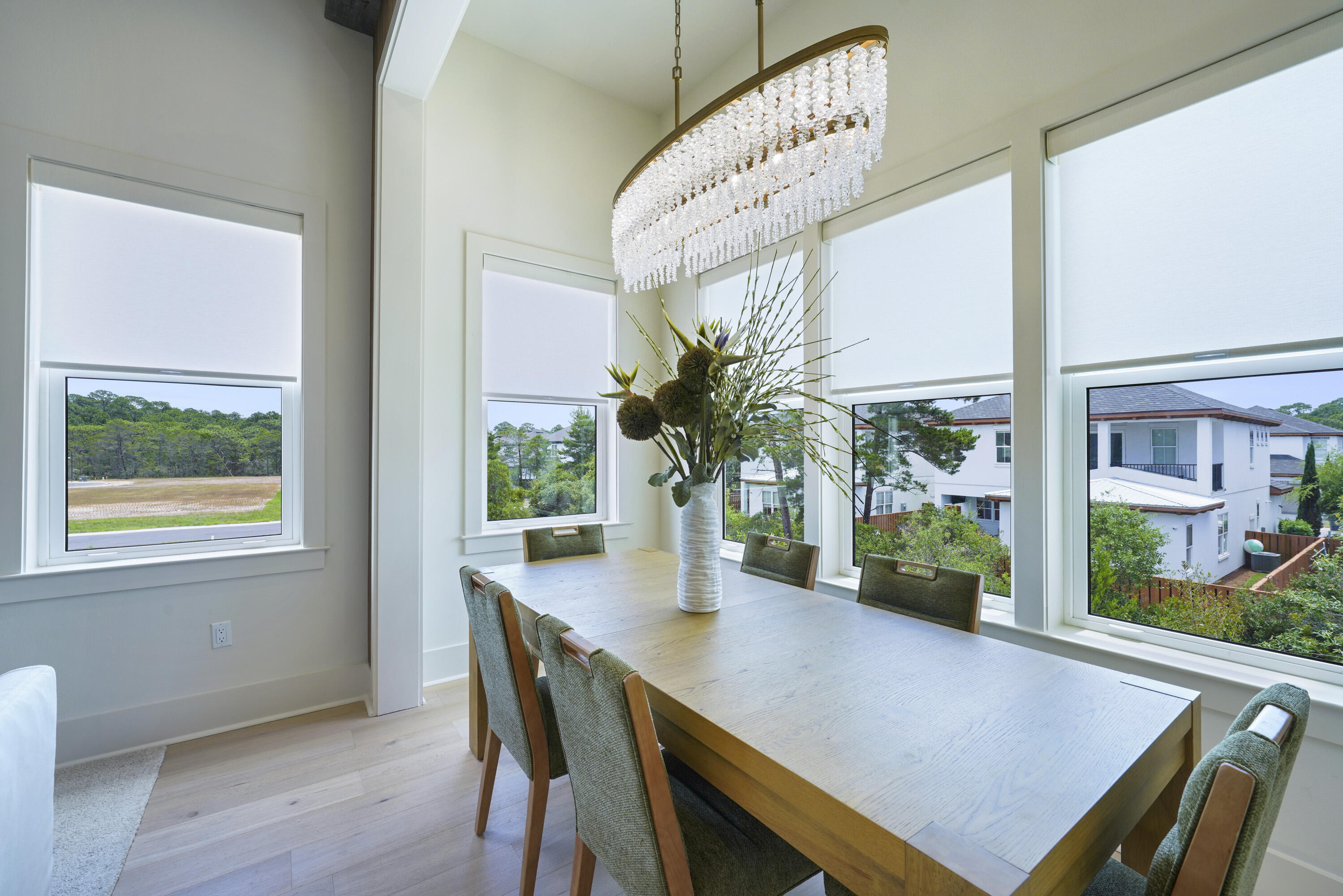 56 Sea Croft Cove Santa Rosa Beach, FL 32459 - Photo 17 of 65 a view of a dining room with furniture window and wooden floor
