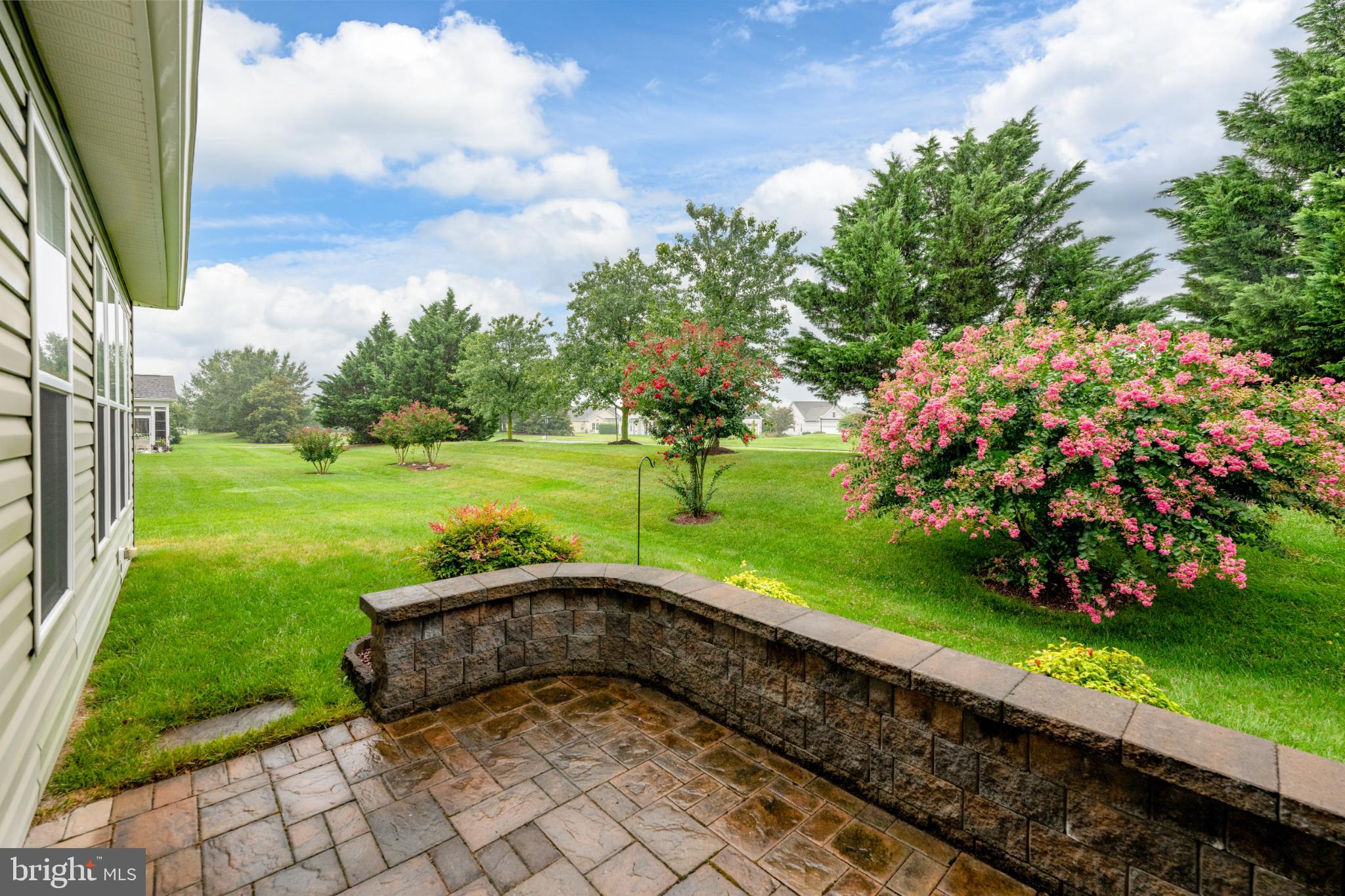 11 Ruddy Duck Lane Bridgeville, DE 19933 - Photo 36 of 57 Tranquil garden view with vibrant blooms.
