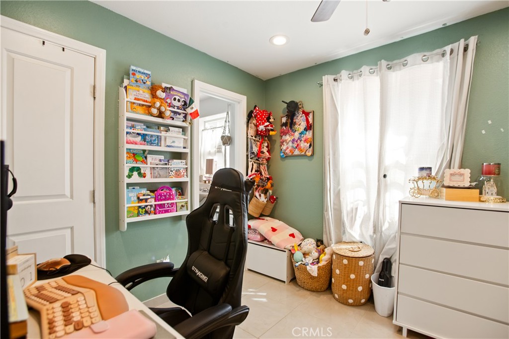 350 North Clifford Avenue Rialto, CA 92376 - Photo 11 of 18 a room with furniture and a window