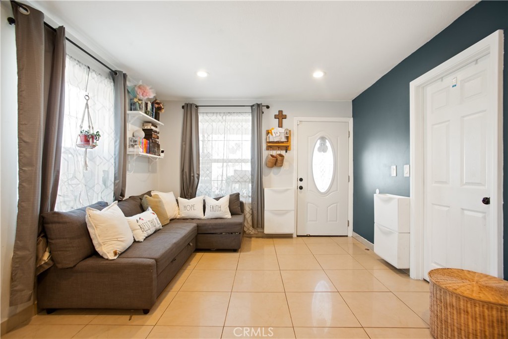 350 North Clifford Avenue Rialto, CA 92376 - Photo 5 of 18 a living room with furniture and a rug