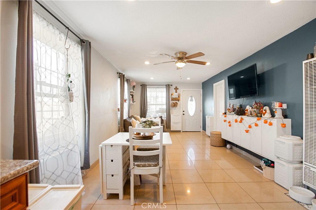 350 North Clifford Avenue Rialto, CA 92376 - Photo 6 of 18 a living room with furniture and a flat screen tv