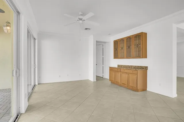 a view of an empty room with a bathroom